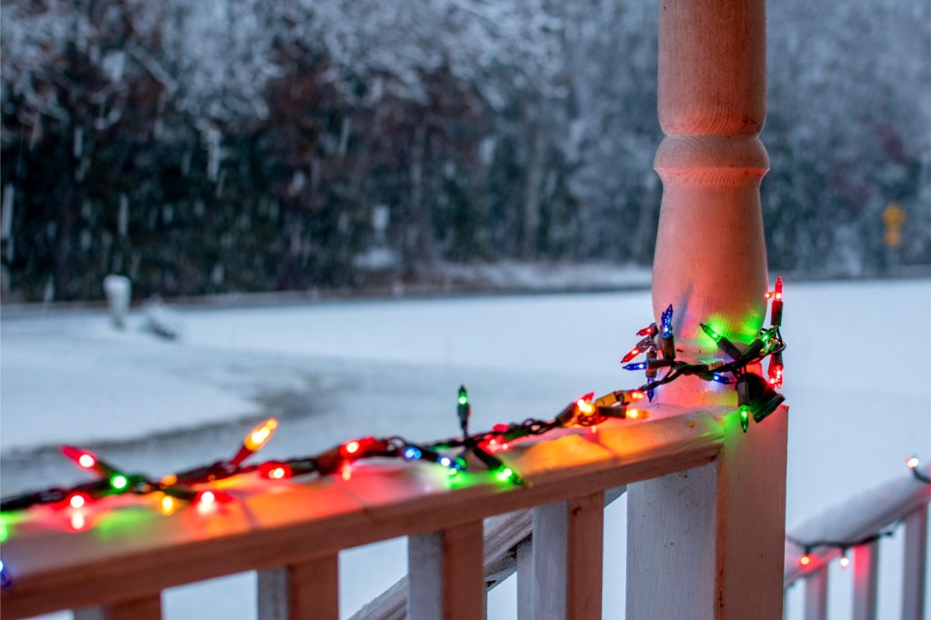 beautiful-holiday-christmas-lights-color-on-porch-installed-by-professional-company